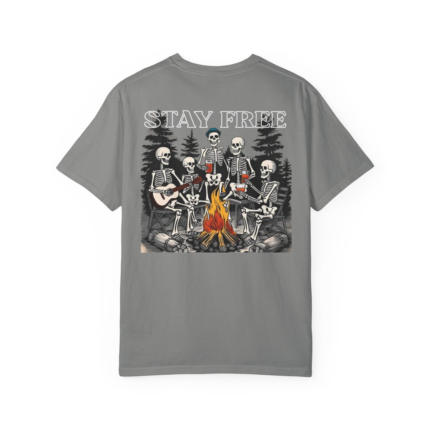 Gray t-shirt with skeletons around a campfire graphic and 'Stay Free' text on a white background